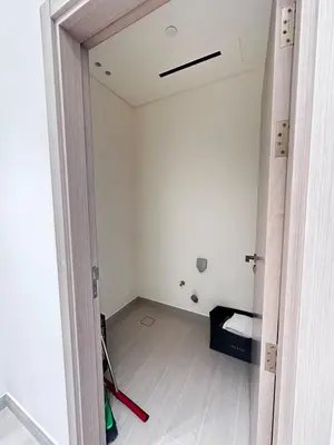 an open door to a room with a bed at Modern1BR Binghatti Phantom Private pool JVC in Dubai