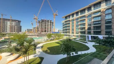 an overhead view of a building with cranes at Contemporary 2BR in Central Park Viridian in Dubai