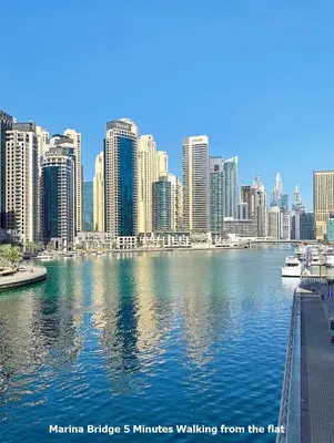 a marina bridge minutes walking from the city at Enjoy Studio in Dubai Marina - Partial Marina View in Dubai