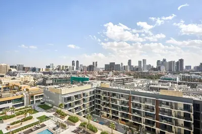 an aerial view of a city with tall buildings at Frank Porter - Binghatti Corner in Dubai