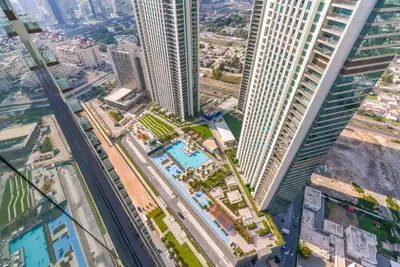 an aerial view of a city with tall skyscrapers at Vogue Downtown Views II with Direct Access to Dubai Mall Via a Climate Controlled Bridge, One Bedroom Apartment with Balcony and City View in Dubai