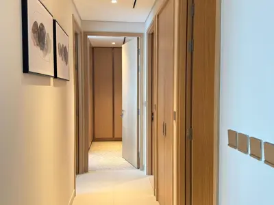 a hallway with a door leading into a room at Luxurious 2 Bedroom Apt in VDM Residences - Full Burj Khalifa View in Dubai
