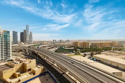 a view of a city with a highway and buildings at 3BHK Near Beach High Floor Marina Stay DEC 1203 Tower 1 in Dubai