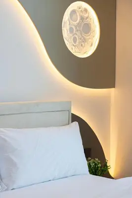 a bedroom with a bed and a light fixture at 3BHK Near Beach High Floor Marina Stay DEC 1203 Tower 1 in Dubai