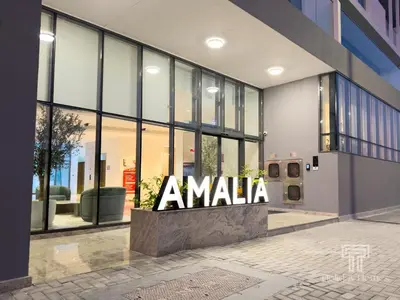 anania sign on the side of a building at Brand New 2 Bed Contemporary Apt-Gym Pool Access in Dubai