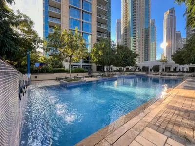a swimming pool in a city with tall buildings at GlobalStay Luxury Apartments The Residences Tower 8 Downtown Dubai in Dubai