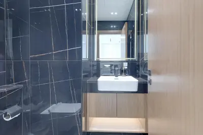 a bathroom with a sink and a mirror at Binghatti House, JVC - 1 Bedroom Apartment - Allsopp & Allsopp in Dubai