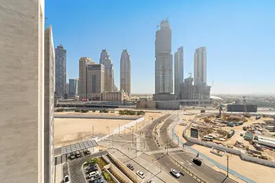 a view of a city skyline with tall buildings at VayK - Elegant Canal-Front 1 BD in a Prime Location in Dubai