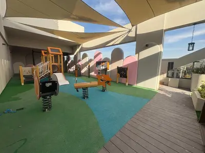 a rendering of a play area with a playground at Frank Porter - Adhara Star in Dubai