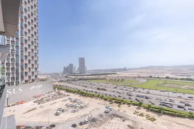 an aerial view of a parking lot in a city at Luxury 2BR Nobles Tower Business Bay by Czechin in Dubai