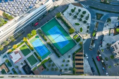 an overhead view of a pool in a city at TRPS - The Grand, Dubai Creek Harbour - Luxury High-Floor 1BR, Creek & Skyline View in Dubai