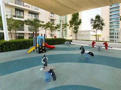 a rendering of a playground with play equipment in a building at Modern 1BR with Palm View Dubai Harbour in Dubai