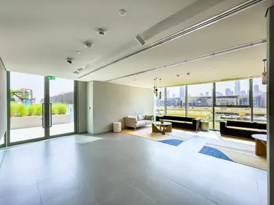 a large living room with a view of the city at Downtown Dubai 1BR Apartment I Balcony I Dubai Mall Access in Dubai