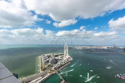 an aerial view of a city and the ocean at Sea View, Direct Beach Access - The Address Residences, JBR by Deluxe Holiday Homes in Dubai