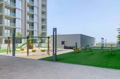 a playground in a building with a playground at Frank Porter - The Crest Tower, Sobha Hartland in Dubai