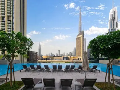 a view of the city from the rooftop of a building at 4BR - Stunning Burj View - Dubai Mall Access in Dubai