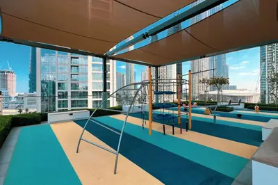 a building with a view of a city skyline at Mahogany 25 - 2BR 10 Guests - Walk to Dubai Mall in Dubai