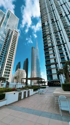 a view of a city skyline with tall buildings at Mahogany 25 - 2BR 10 Guests - Walk to Dubai Mall in Dubai