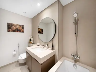 a bathroom with a sink and a mirror at Luxury 4BR Villa in Arabian Ranches 3, Resort-Style Living with Private Garden & Hot Tub in Nadd Shubayḩ