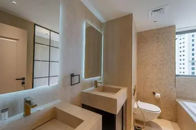a bathroom with a sink and a toilet at Murjan 2702 in Dubai