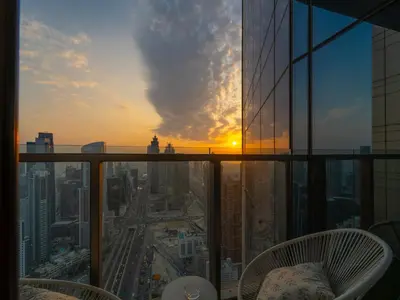 a view of a sunset from the top of a building at Luxury 1BR High floor Paramount Midtown in Dubai