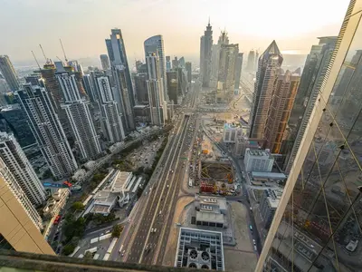 a view of a city from the top of a skyscraper at Luxury 1BR High floor Paramount Midtown in Dubai