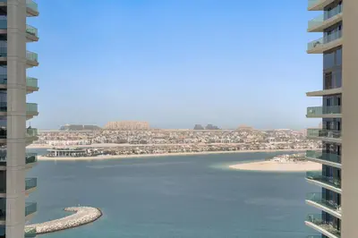 a view of the beach from a building at Silkhaus 1BDR in Marina Vista Tower Private Beach in Dubai