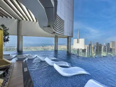 a rendering of a pool of water in a building at Restay Homes at Paramount Midtown Hotel - Infinity pool access included in Dubai