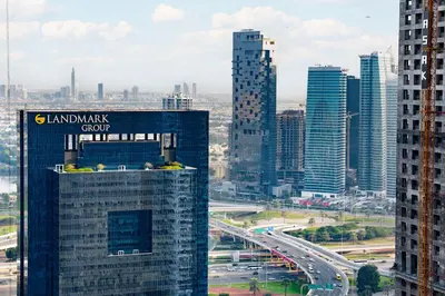 a view of a city with buildings and a highway at Modern and Stylish 2-BR High Floor All Bills Included in Dubai