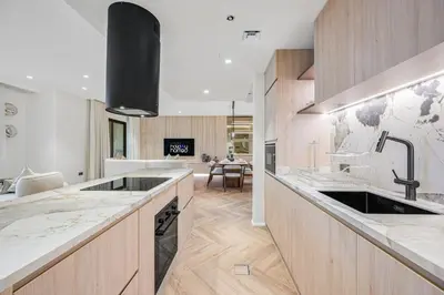 a kitchen with a sink and a counter at Modern 1BR JBR Stunning Sea & Ain Dubai Views in Dubai