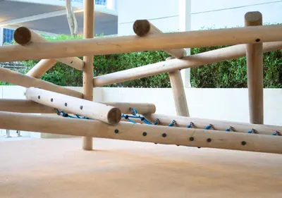a close up of the back of a wooden swinginet at Luxury Apt Canal View - 5min Burj & Dubai Mall in Dubai