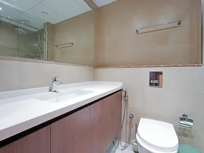 a bathroom with a sink and a toilet at Well-Maintained 2-Bedroom Home in Community-410 in Dubai