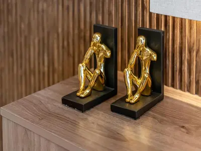 a couple of awards sitting on top of a shelf at EMAAR GRANDE - Cozy 1 Bedroom Apartment - Infinity Pool - 1min to Dubai Mall and Burj Khalifa in Dubai