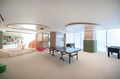a room with a ping pong table in the middle at Iconic Binghatti Royale! Private Pool in Your Balcony! 5 Star Amenities! in Dubai