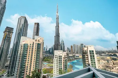 a view of a large city with tall buildings at Stunning Burj & Fountain View Downtown 29 Blvd in Dubai