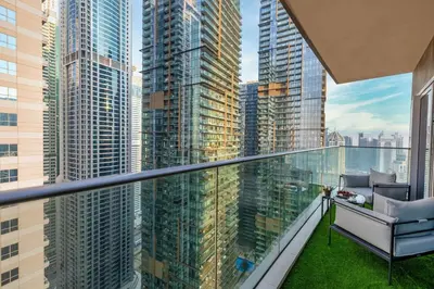a balcony with a view of a city at Luxe Living At Damac heights - Dubai Marina - Marina & Sea Views in Dubai