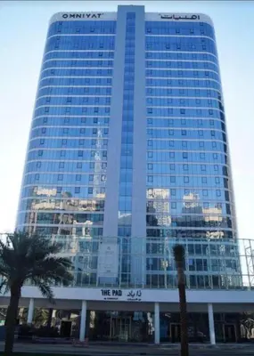 a tall building with a sign in front of it at Luxury 1BR near Burj Khalifa Business Bay Free Parking in Dubai