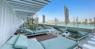 a view from the roof of a hospital with chairs at Luxury 3BHK & Maid Sea View & Private Beach in Sabkhah