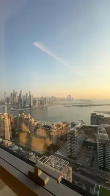 a view of a city from a skyscraper at PALM TOWER by Design Studio 1 BR in Dubai
