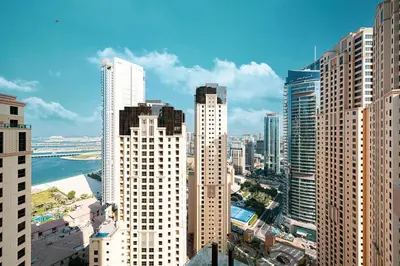 an aerial view of a city with tall buildings at Stunning 2BR with Sea View Murjan 1 Near Beach in Dubai