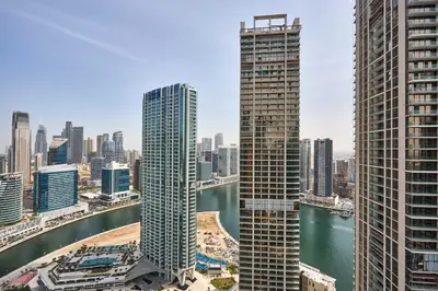 a view of a city skyline with tall buildings at Frank Porter - Peninsula One in Dubai
