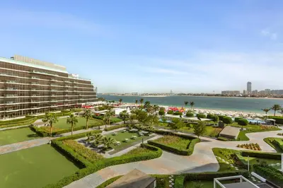 an aerial view of a resort and the ocean at Stunning 2 Bedroom in Palm with private beach in Dubai