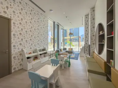 a dining room with tables and chairs and a wall of windows at Elegant 1BR LIV Marina Dubai World-Class Amenities in Dubai
