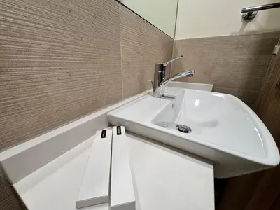 a bathroom with a sink and a bath tub at Celestial 2BR with Burj Khalifa View in Dubai