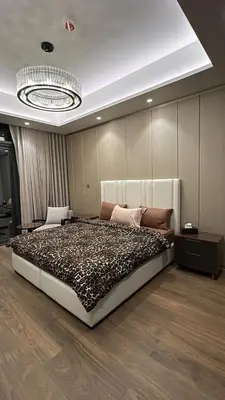 a bedroom with a large bed in a room at Stylish 2BR in Business Bay with all essentials in Dubai