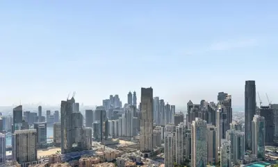 an aerial view of a city with tall buildings at Prime Downtown Luxury Stays by Burj Khalifa in Dubai
