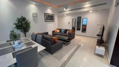 a living room with two couches and a table at Dubai Marina Apartment Steps to DMCC Metro & JBR in Dubai