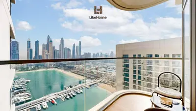 a view of a city skyline from a balcony at Stunning 2BR Beachfront Living Marina Vista Tower 2 in Dubai