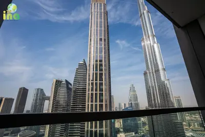 a view of a city skyline with tall buildings at INA HOMES - Modren 2 Bedroom Apartment with Full Burj Khalifa View in Dubai