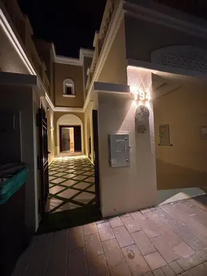 an empty hallway of a building at night at Dubai Escape Private Pool and Parking in Dubai